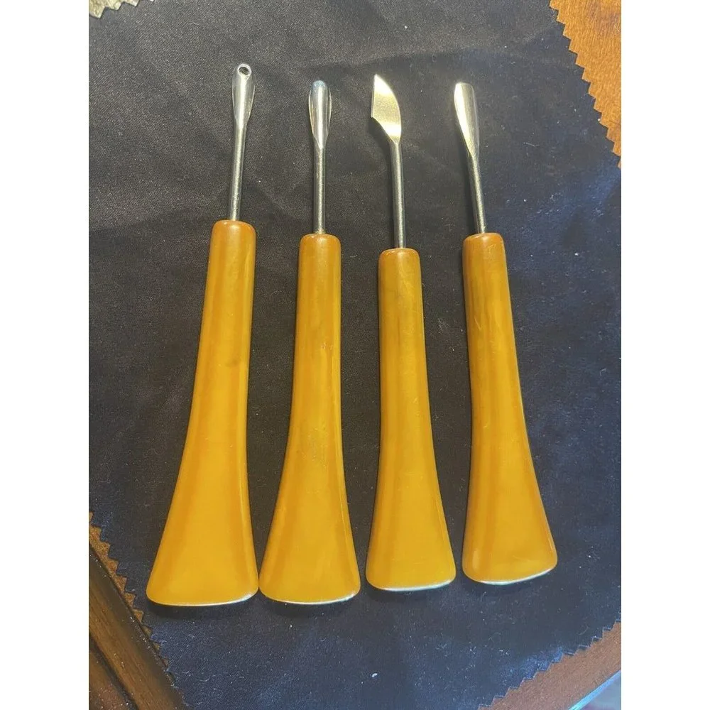 Egg Yolk Bakelite Four Piece Manicure Set